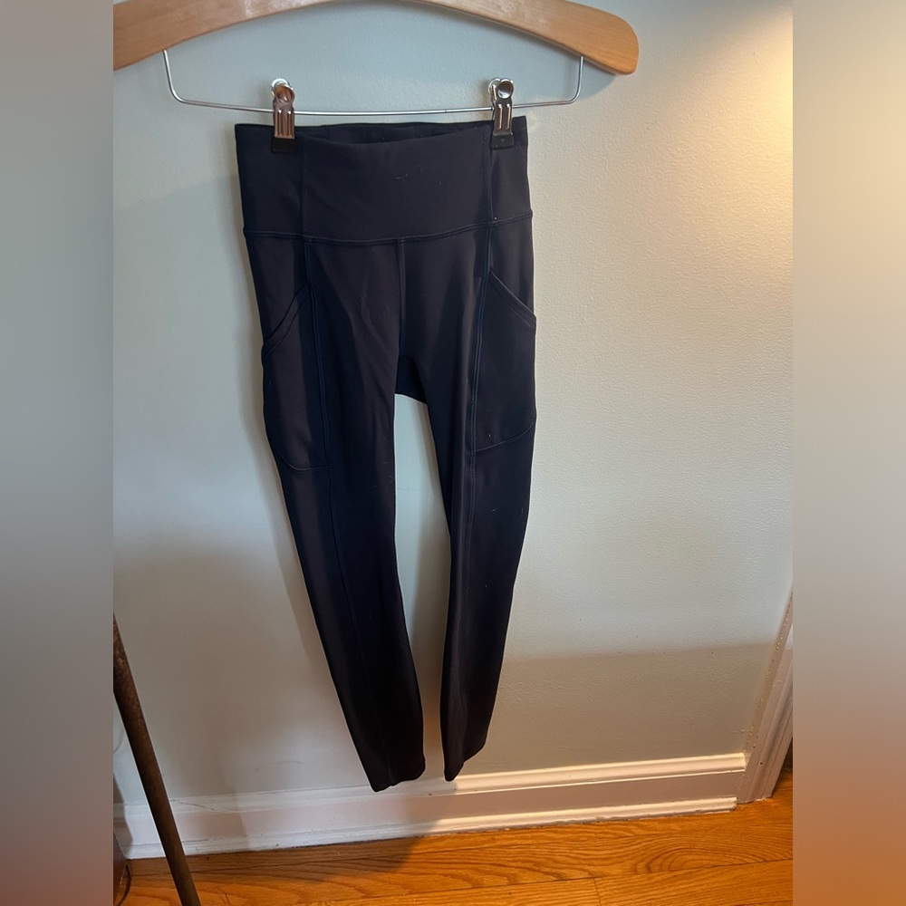 Navy blue, Lululemon leggings, size 0, gently worn and like new.